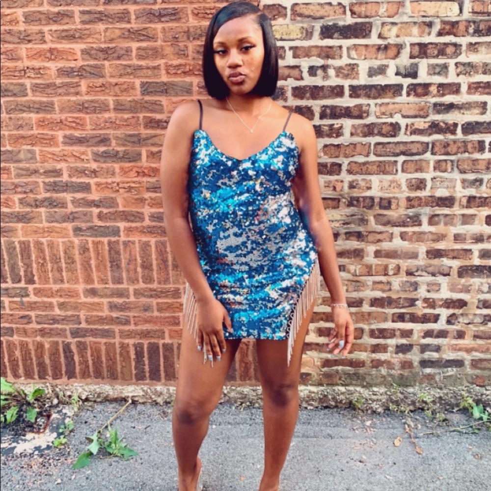 A blue sequin dress only worn once.